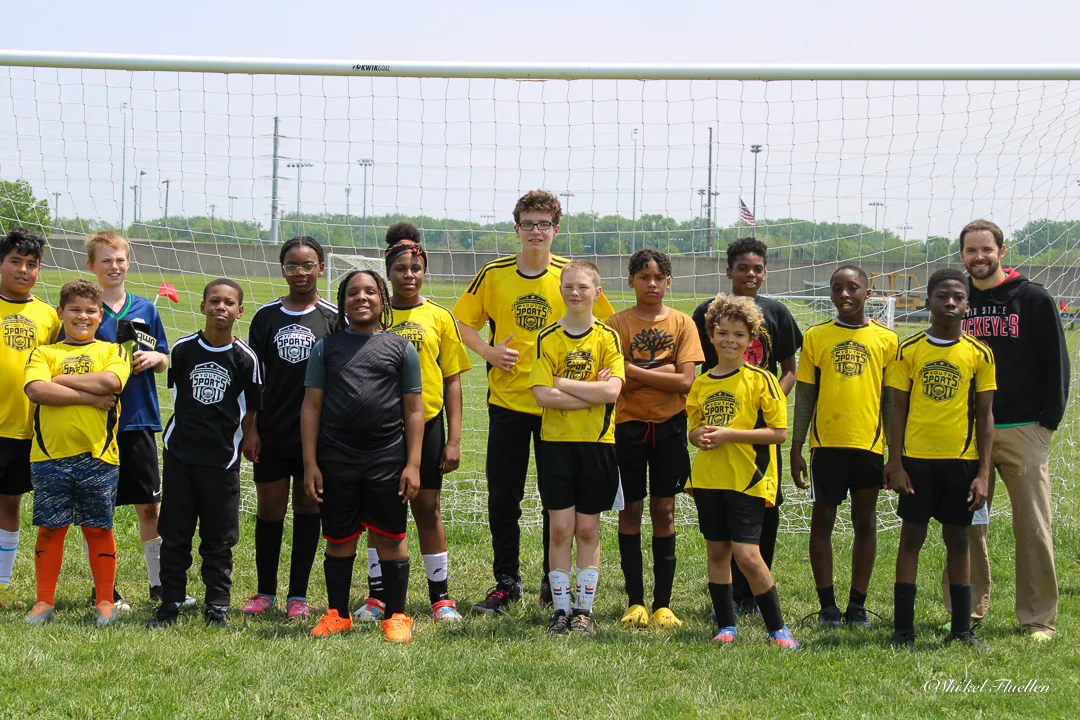 Youth soccer team photographed together on the field